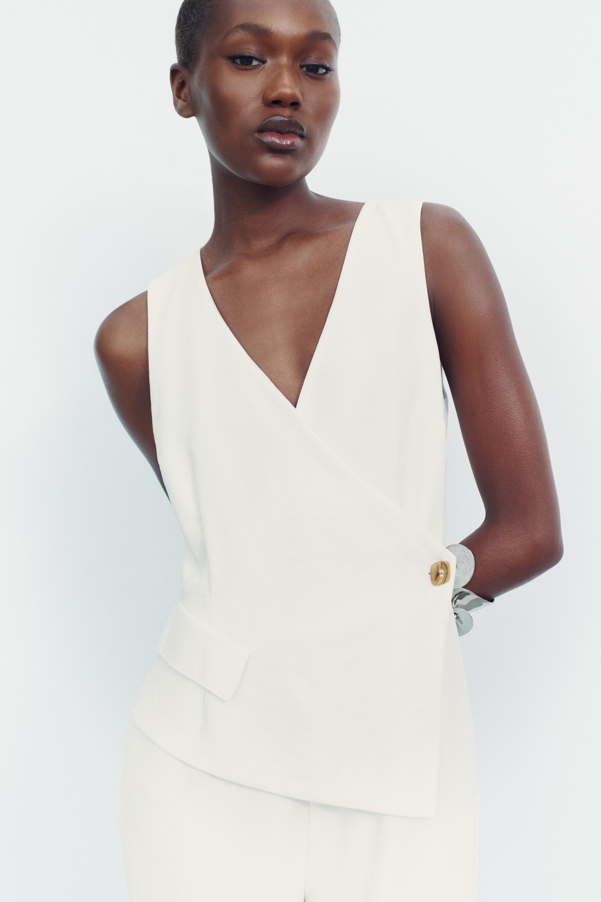 JUMPSUIT WITH ASYMMETRIC WAISTCOAT