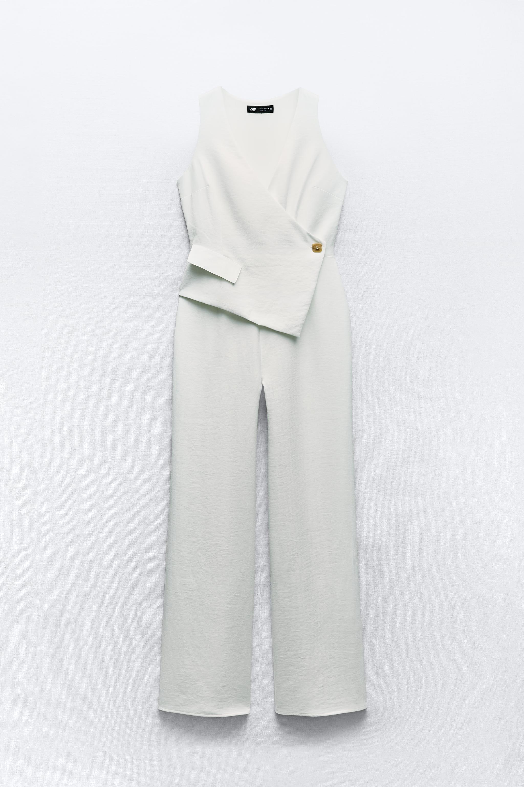 JUMPSUIT WITH ASYMMETRIC WAISTCOAT