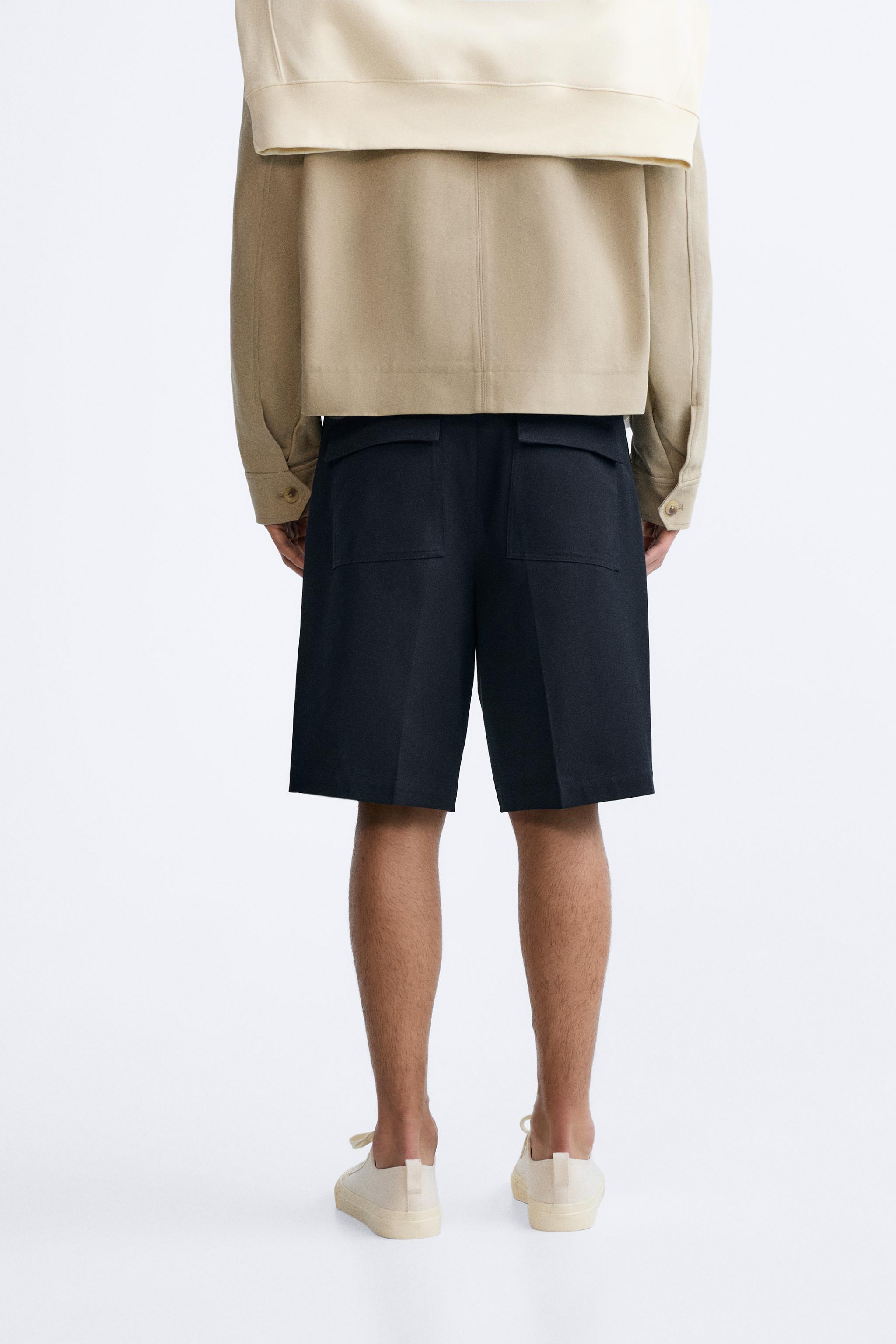 TEXTURED BERMUDA SHORTS WITH PLEATS